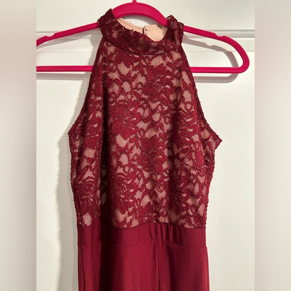 Red and lace floor length gown with slit